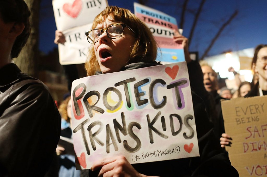 LGBT activists gather outside the Stonewall Inn (Photo by Spencer Platt/Getty Images)